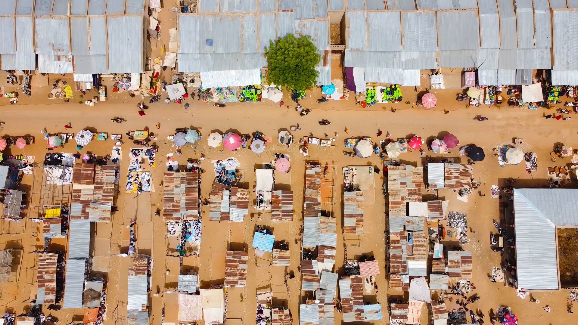 A crowded open-air market seen from above